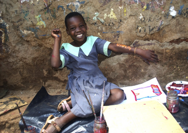 “Healing strokes”: Malawian children brush away pain with paint